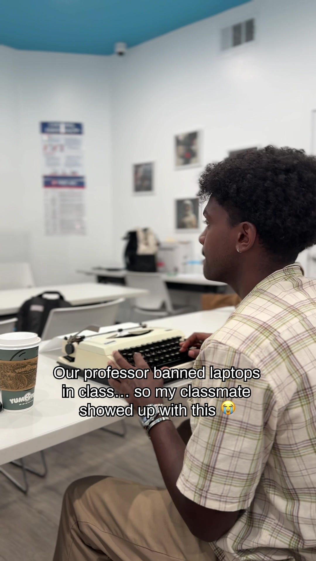 Our professor banned laptops in class... so my classmate sho